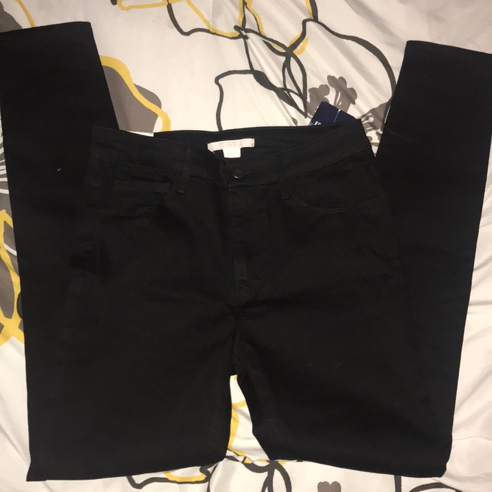 black mid rise skinny jeans